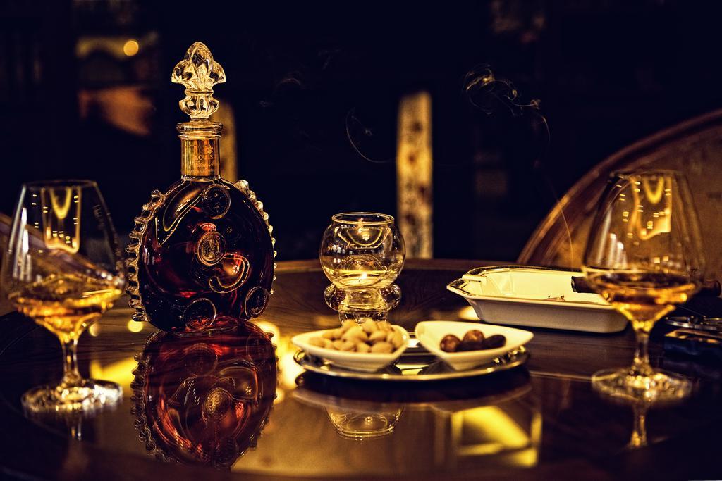 Retro Riverside Wellness Resort Карловы Вары Экстерьер фото A bottle of Rémy Martin Louis XIII