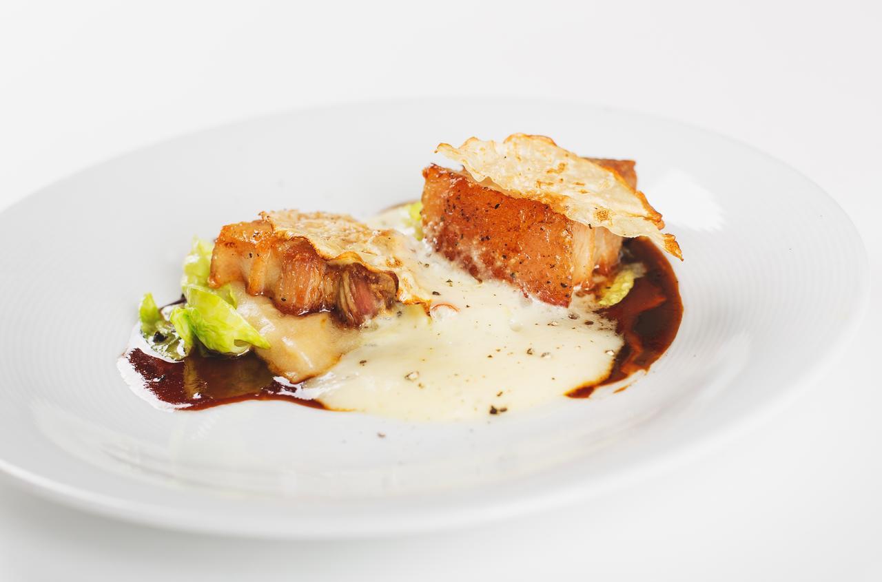 Retro Riverside Wellness Resort Карловы Вары Экстерьер фото A prepared dish of monkfish